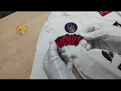 Corrections brodées faites sur commande de lettre de crâne avec le support d'adhésif de frontière de Merrow