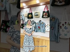 La broderie faite sur commande en gros raccorde le fer sur les corrections tissées pour l'habillement