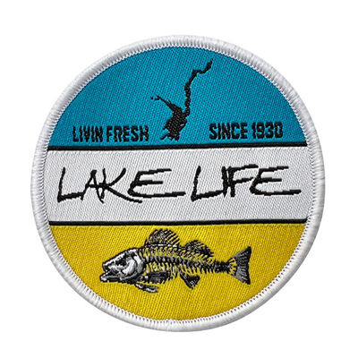 La broderie faite sur commande de la vie de lac raccorde le fer d'OEM sur la correction tissée pour l'habillement de chemise