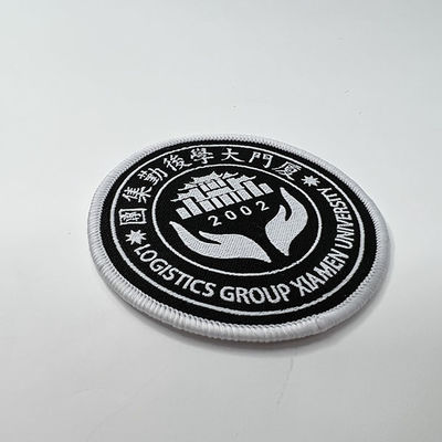 Fer de correction de broderie d'habillement d'université à la frontière tissée de Merrowed de correction