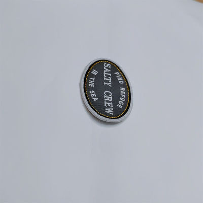 Correction lavable d'habillement de frontière faite sur commande de Logo Embroidered Iron On Patches Merrow