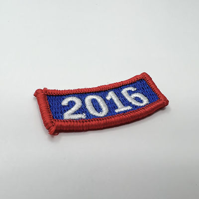 La broderie faite sur commande de nombre d'année raccorde le fer de frontière de Merrow sur des corrections de broderie