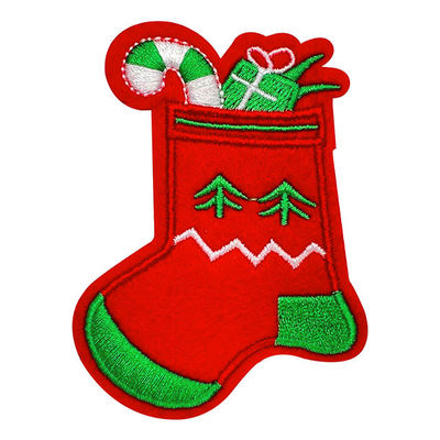 Le cadeau de Noël cogne le fer senti lavable brodé fait sur commande de tissu de corrections sur le support