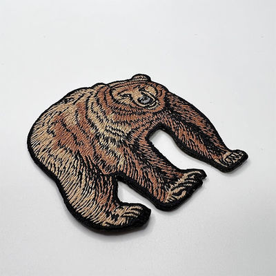 Fer fait sur commande de correction de broderie d'ours de Brown sur soutenir la frontière brodée pour des sacs de veste