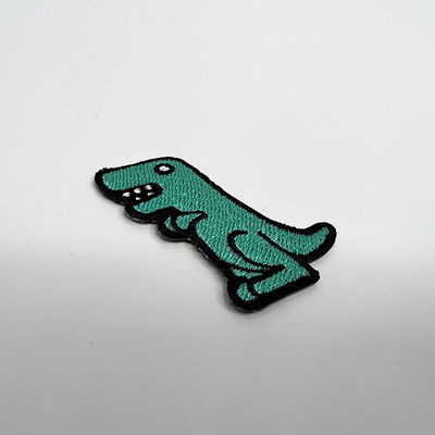Fer brodé fait sur commande de corrections de la couleur 5CM du dinosaure PMS sur des corrections d'habillement