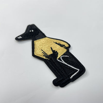 Le fer animal sur les corrections brodées symbolisent la correction de broderie d'Applique de souvenir
