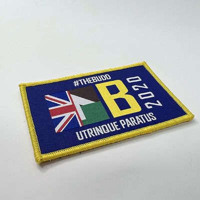 Le fer personnalisé à la frontière de Merrow de corrections de broderie cousent/fers sur les insignes tissés faits sur commande