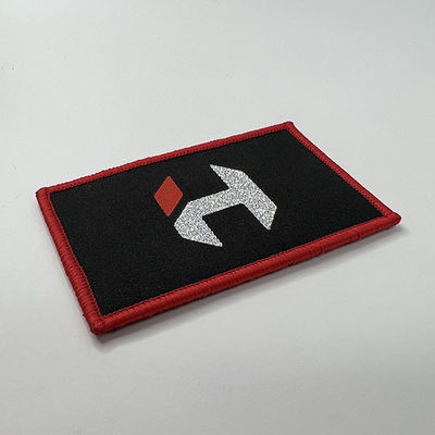 Fer rouge de frontière de Merrow sur les corrections tissées par fonte chaude imperméable de correction de broderie